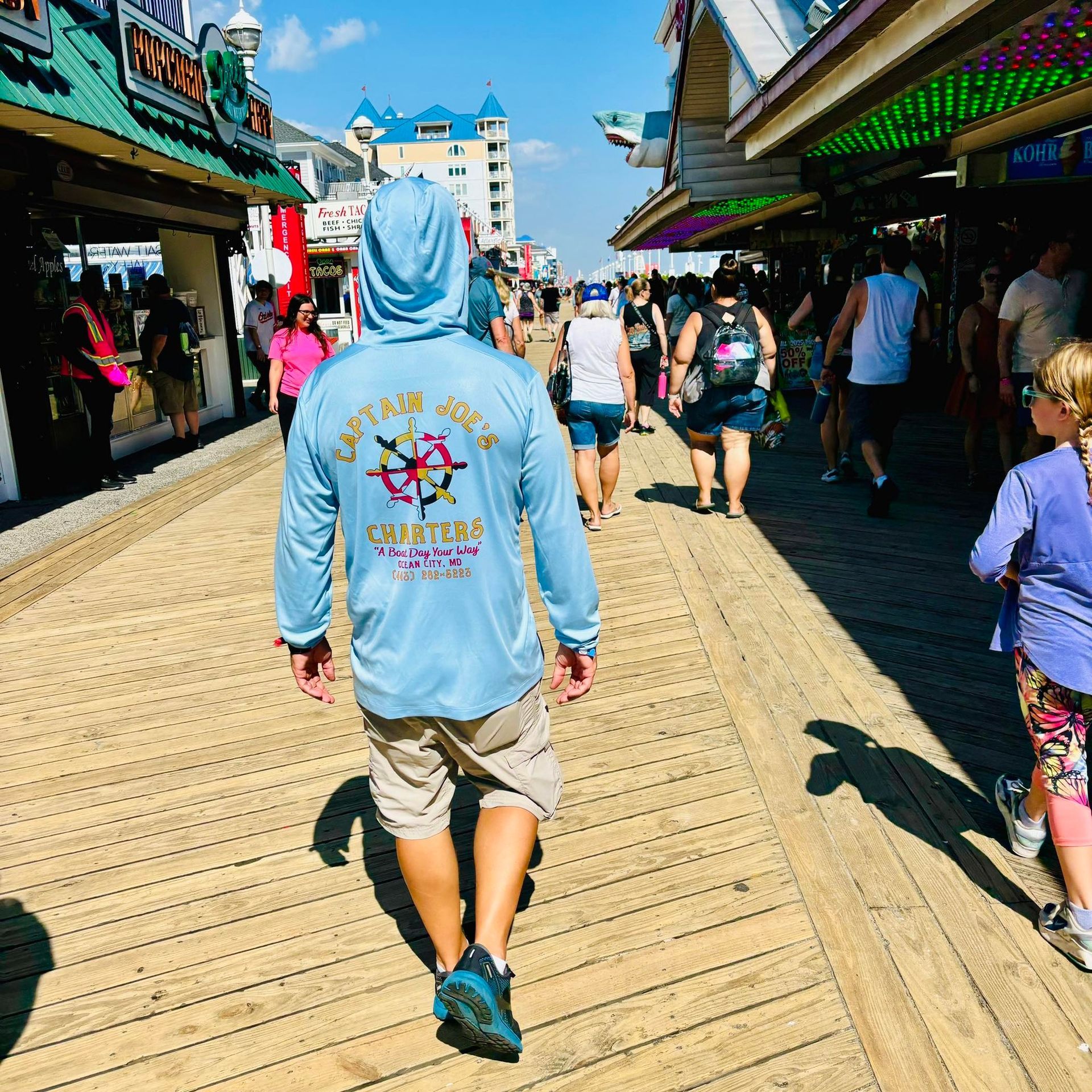 Captain Joe walking on the boardwalk in Ocean City MD.
