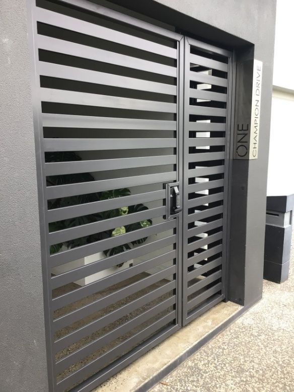 A Black Gate With A Sign That Says One On It — Ward's Aluminium in Charter Towers, QLD