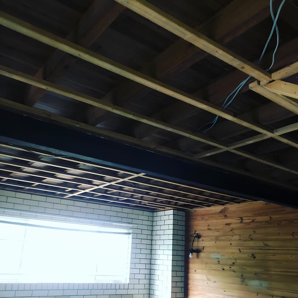 A Room With a Wooden Ceiling and a Window — Veramax Industries in Park Avenue, QLD