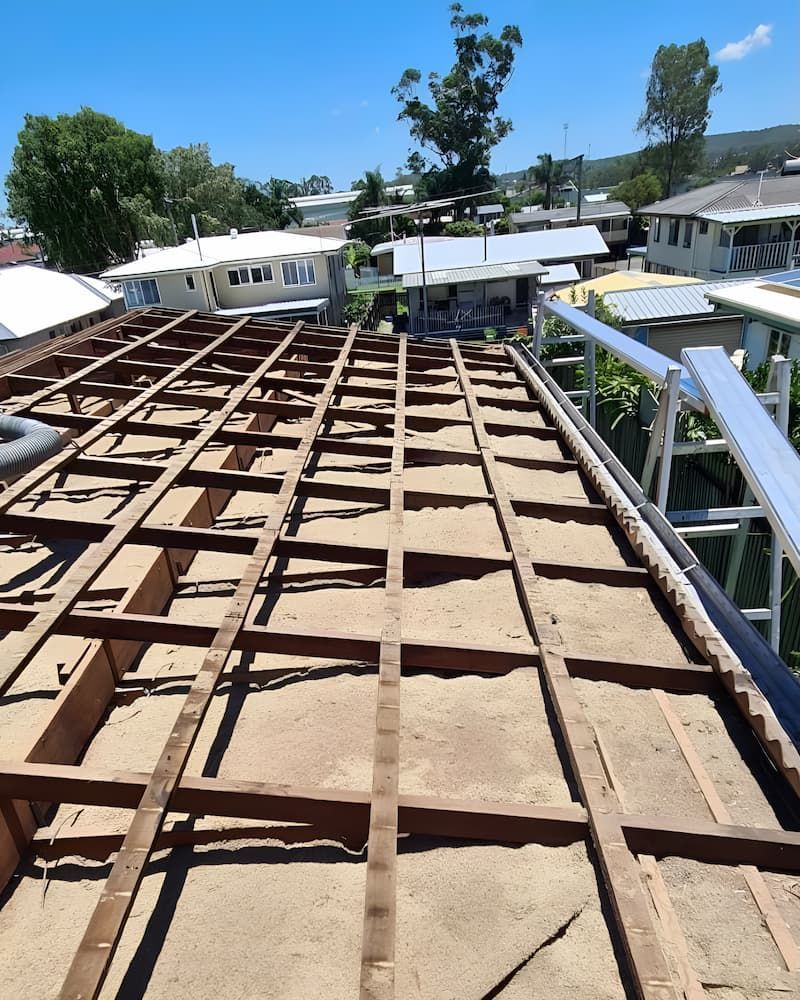 A Roof With a Lot of Wooden Beams on It — Veramax Industries in Park Avenue, QLD