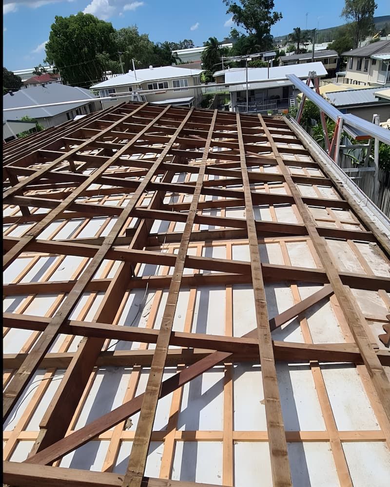A Roof With a Lot of Wooden Beams on It — Veramax Industries in Park Avenue, QLD