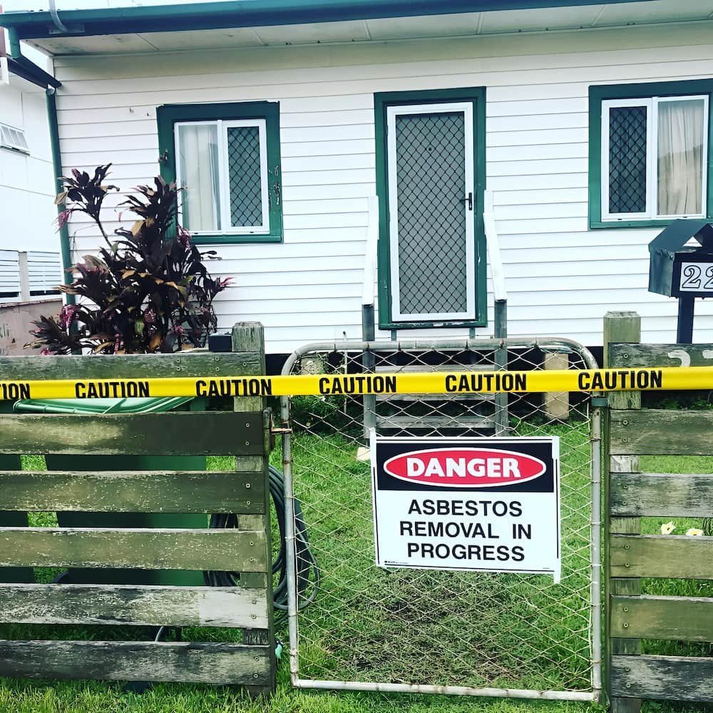 A House With a Danger Sign in Front of It — Veramax Industries in Park Avenue, QLD
