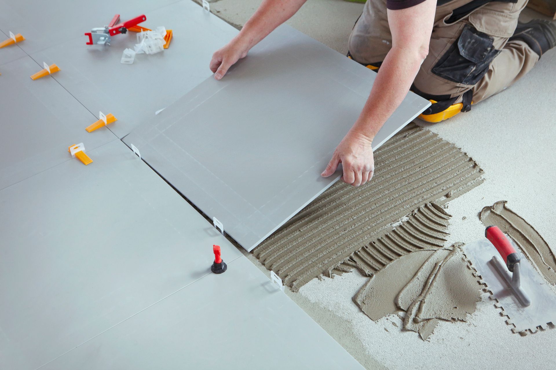 Person Tiling Floor — San Antonio, TX — Villa Tile Service