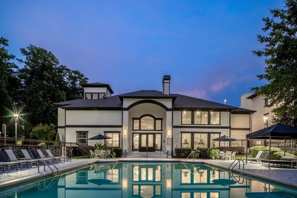 Swimming pool at night at Marq Perimeter in Atlanta, GA.