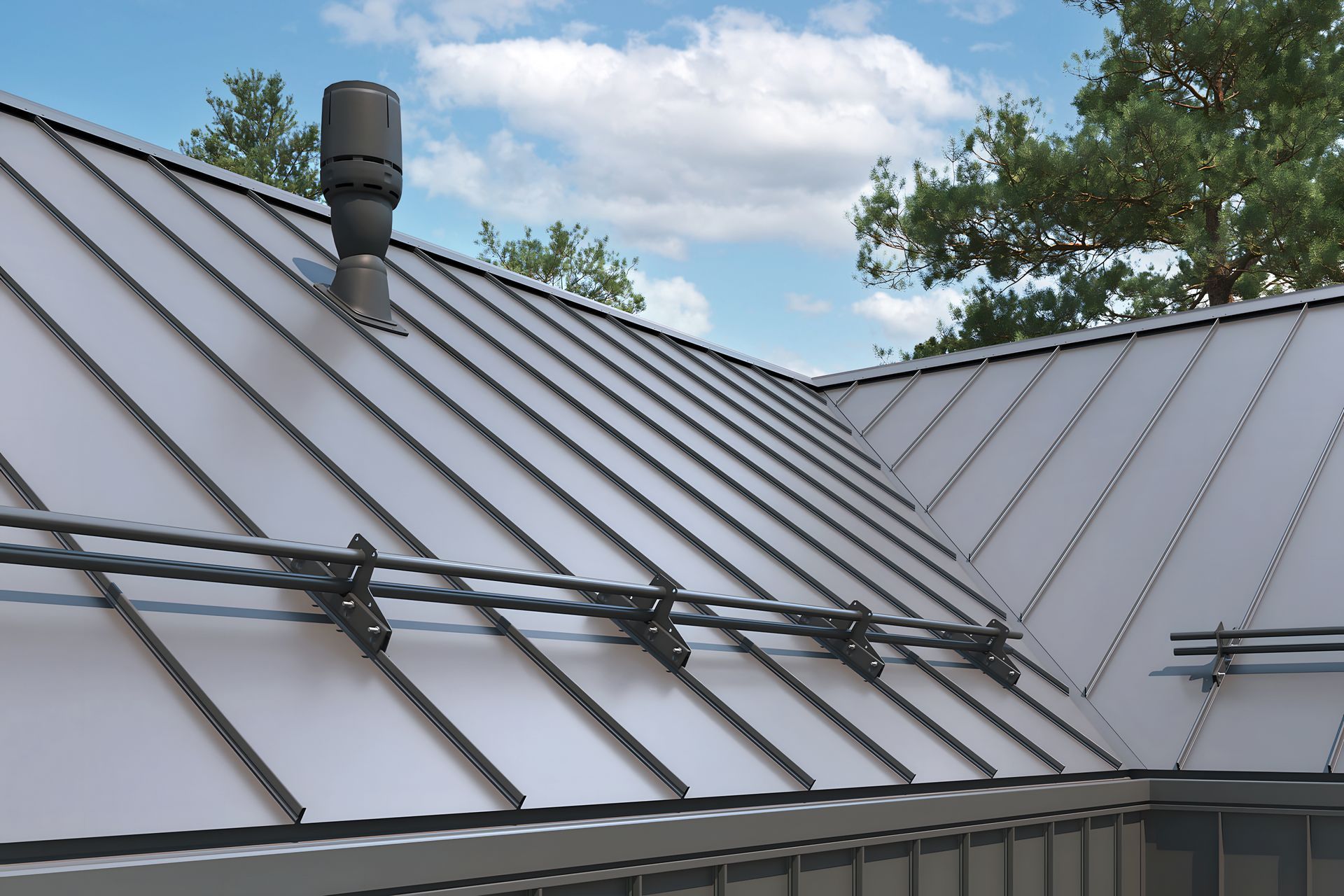 A close-up of a standing-seam metal roof with a chimney stack and mounted snow guards against a blue, cloudy sky.