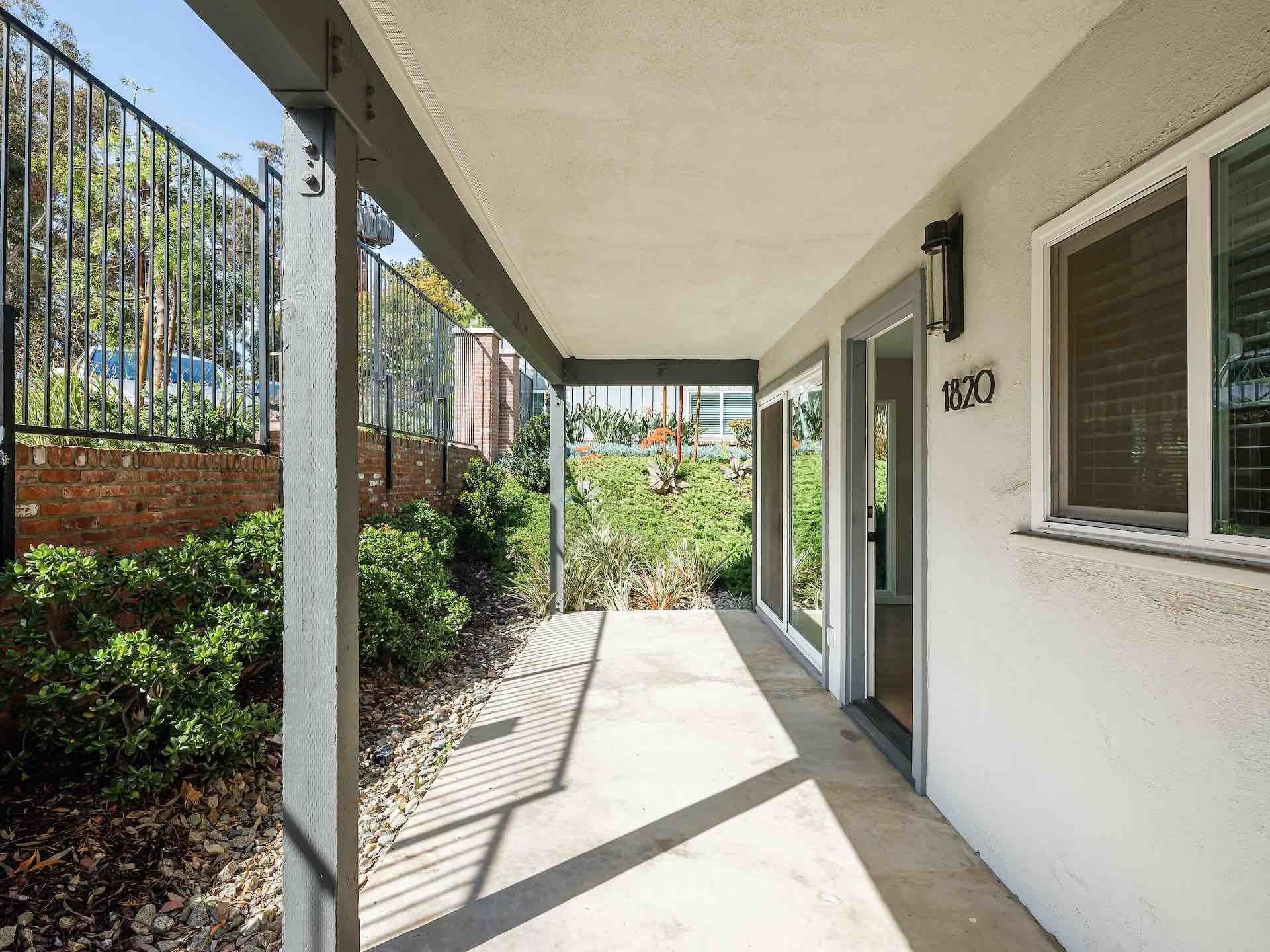 Walkway in front of apartment entryway
