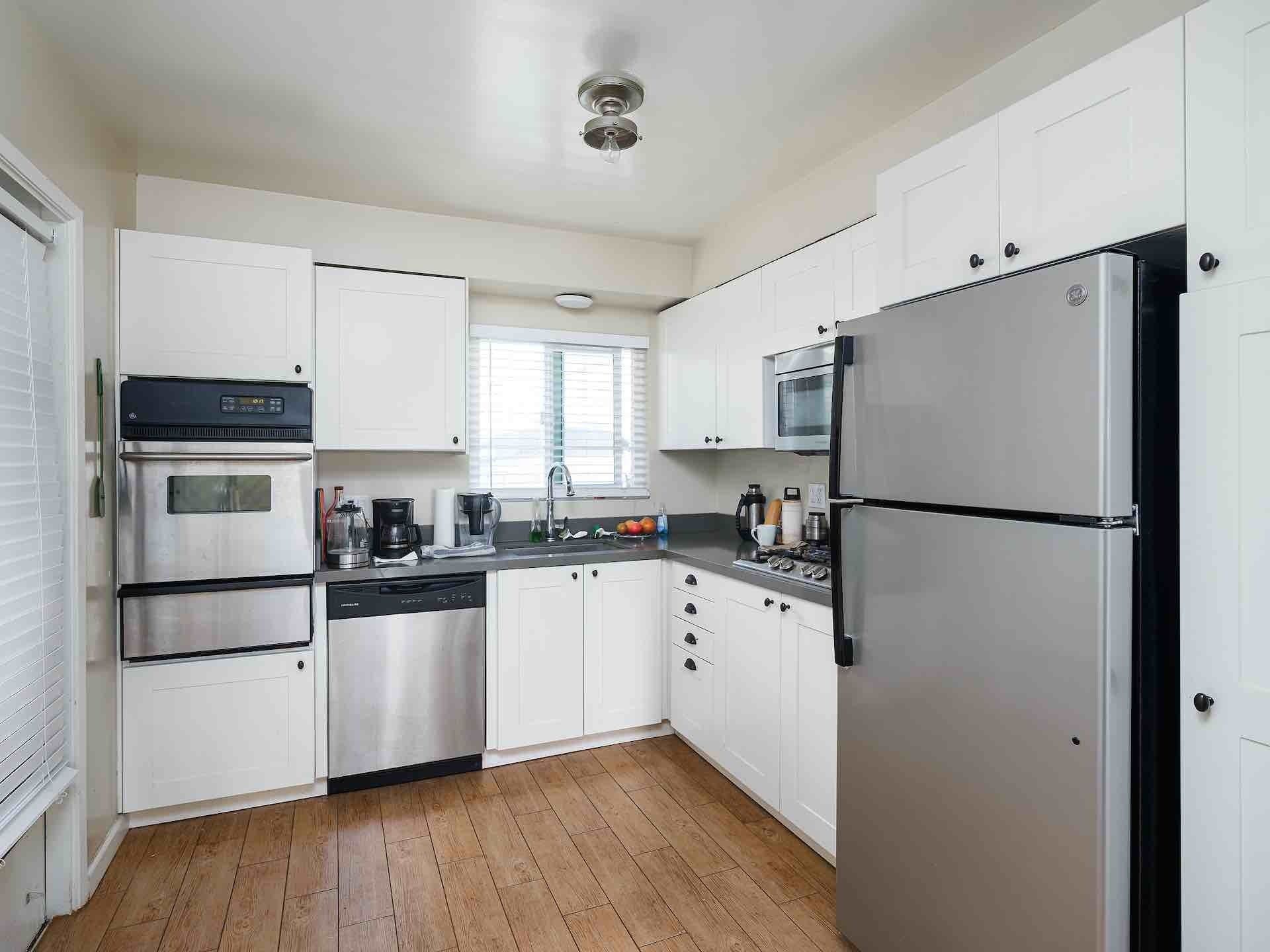 Interior of kitchen with stainless steel appliances