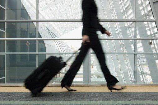 Woman walking with Traveling Bag - Travel Document Services in Los Angeles, CA Woman walking with Traveling Bag - Travel Document Services in Los Angeles, CA