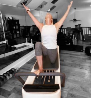 An image of Pilates Instructor Victoria Bentley demonstrating her Pilates studio in Bozeman MT.