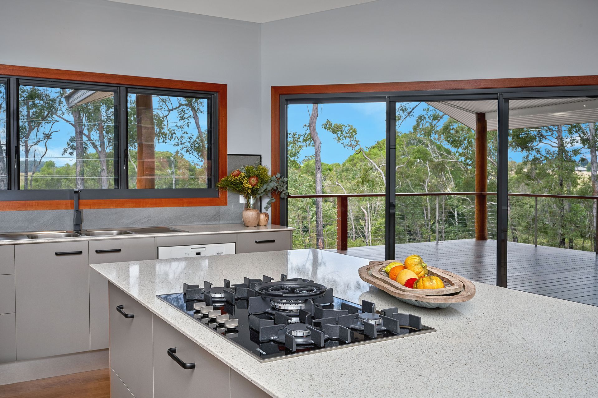 A Kitchen With A Gas Stove— ROGA Build Solutions in Atherton, QLD