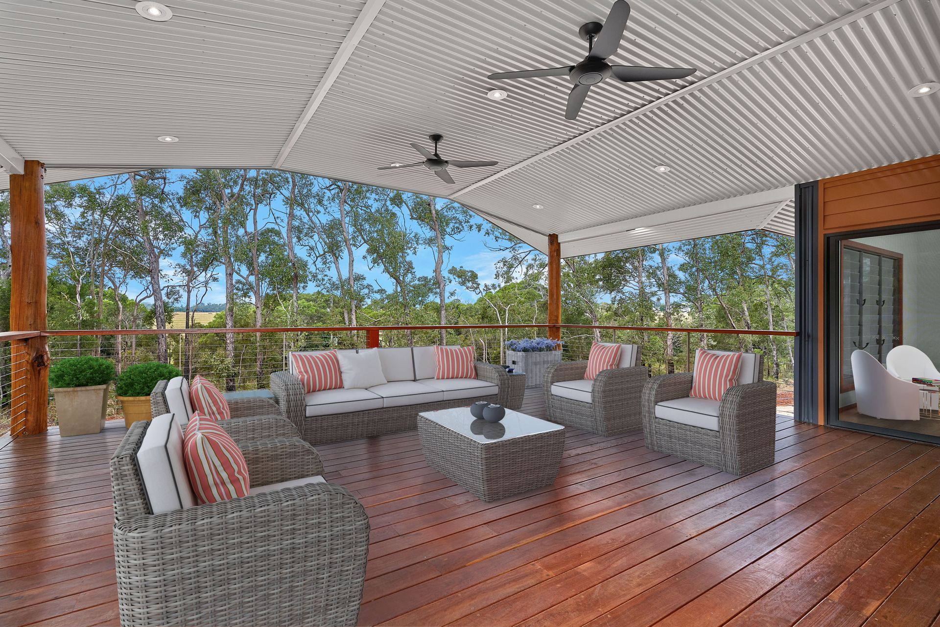 A Kitchen Looking Out To A Deck And A Lake — ROGA Build Solutions in Atherton, QLD