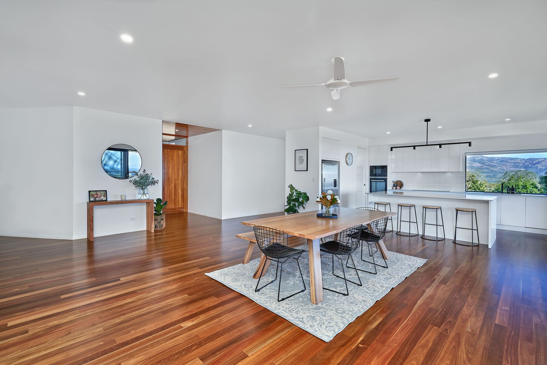A Large Living Room And Kitchen — ROGA Build Solutions in Atherton, QLD
