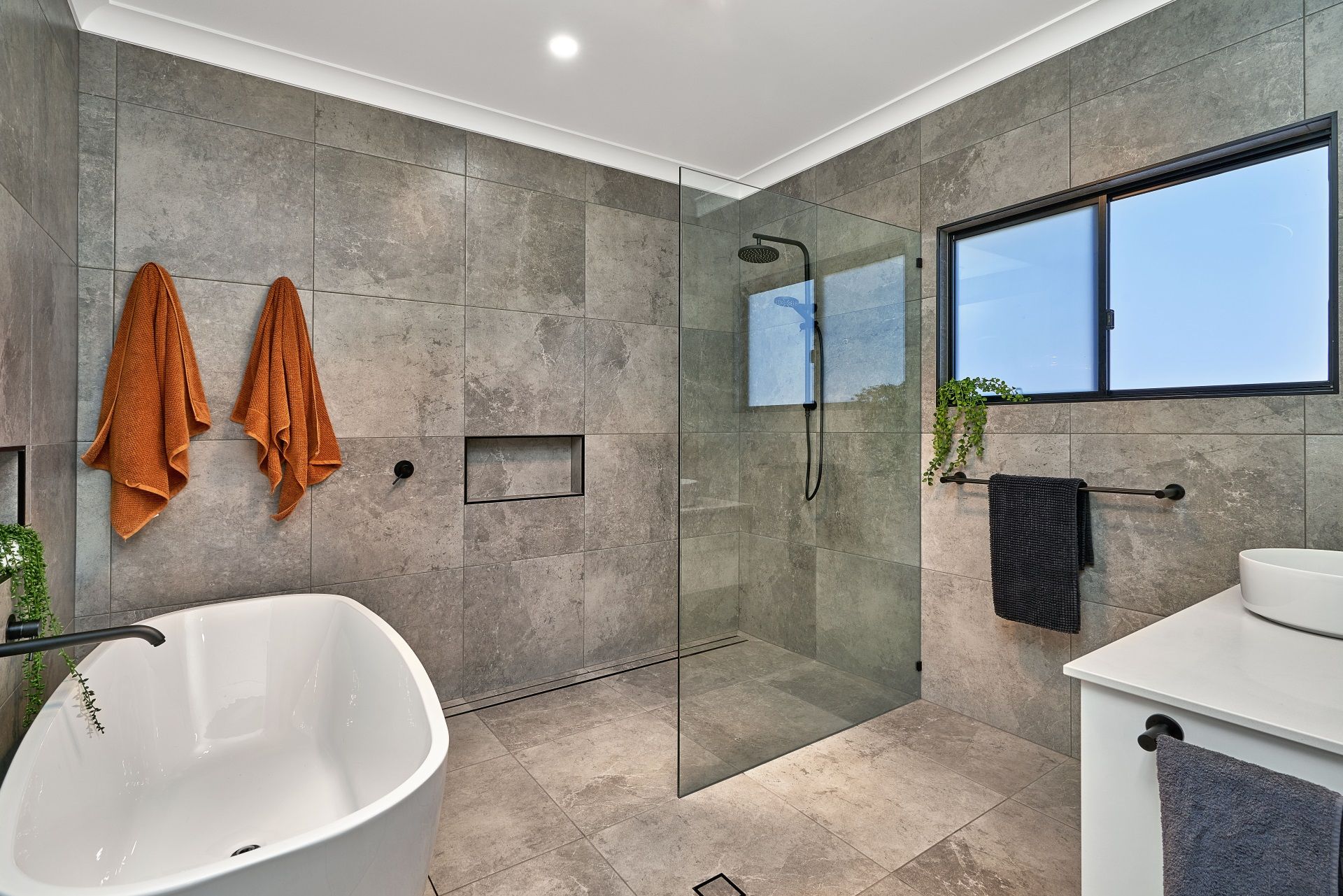 A Bathroom With A Walk In Shower — ROGA Build Solutions in Atherton, QLD