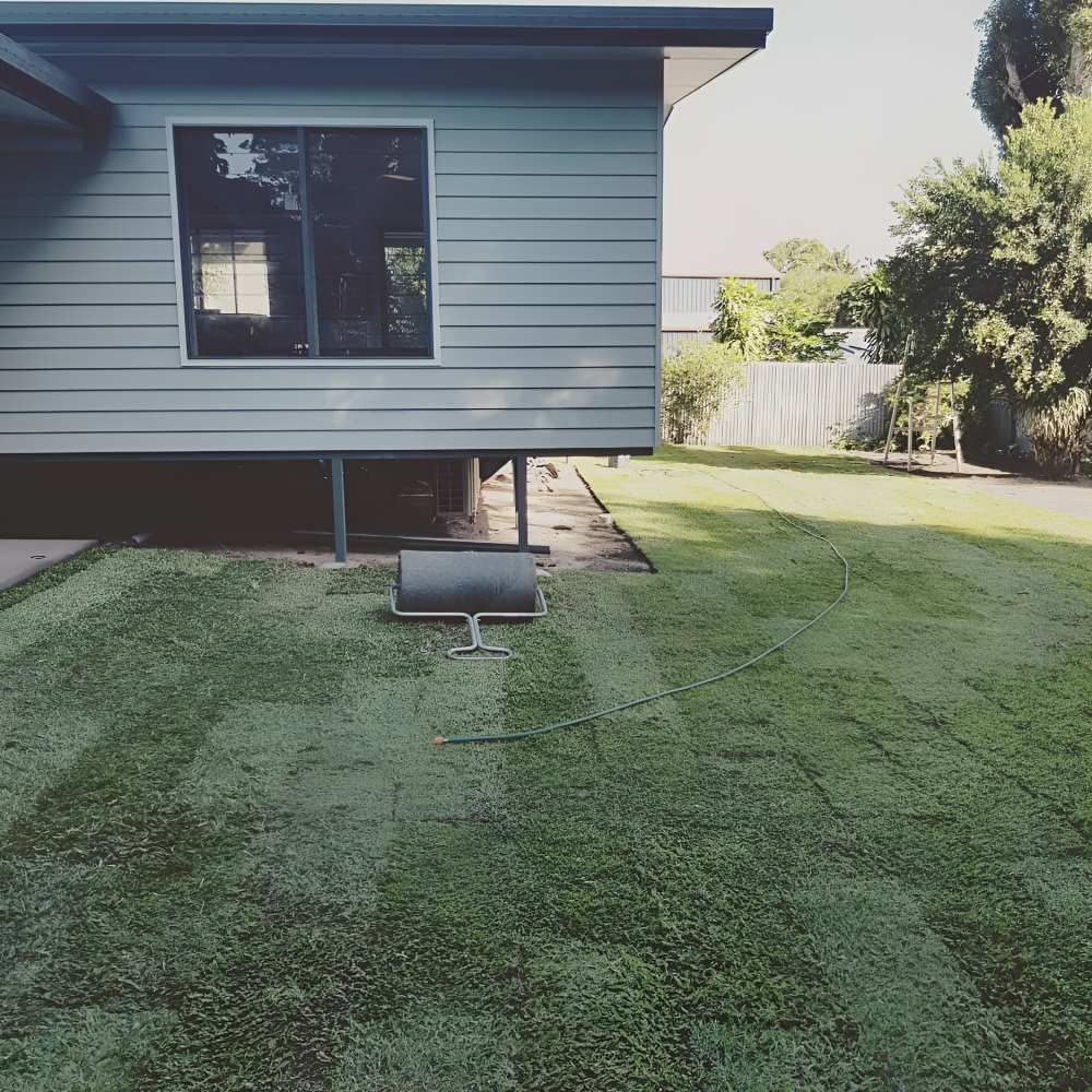 A House With a Large Lawn in Front of It — ROGA Build Solutions in Mareeba, QLD