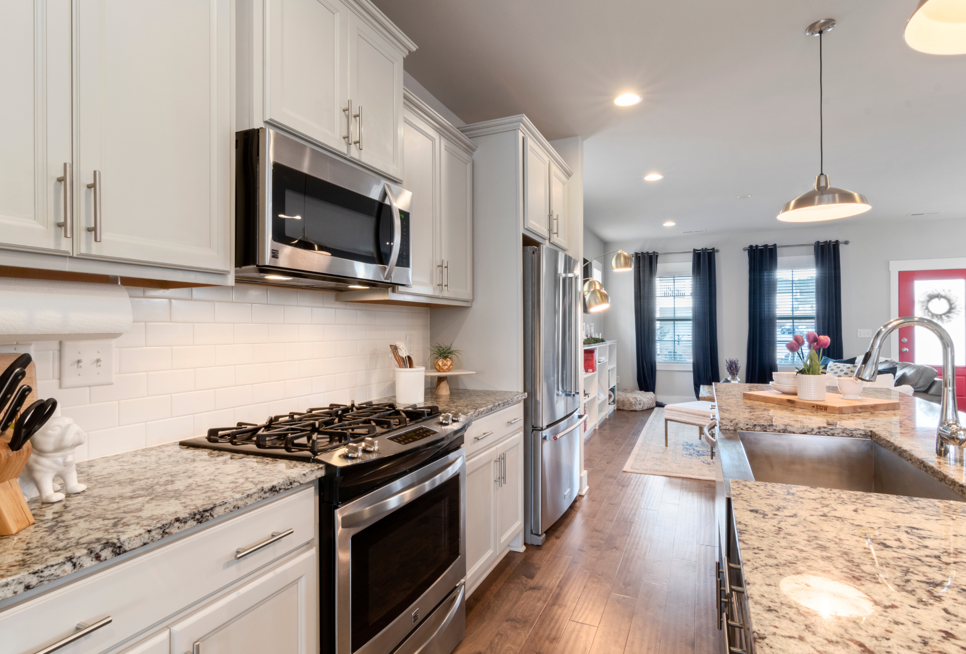 A red rug with a floral pattern on it