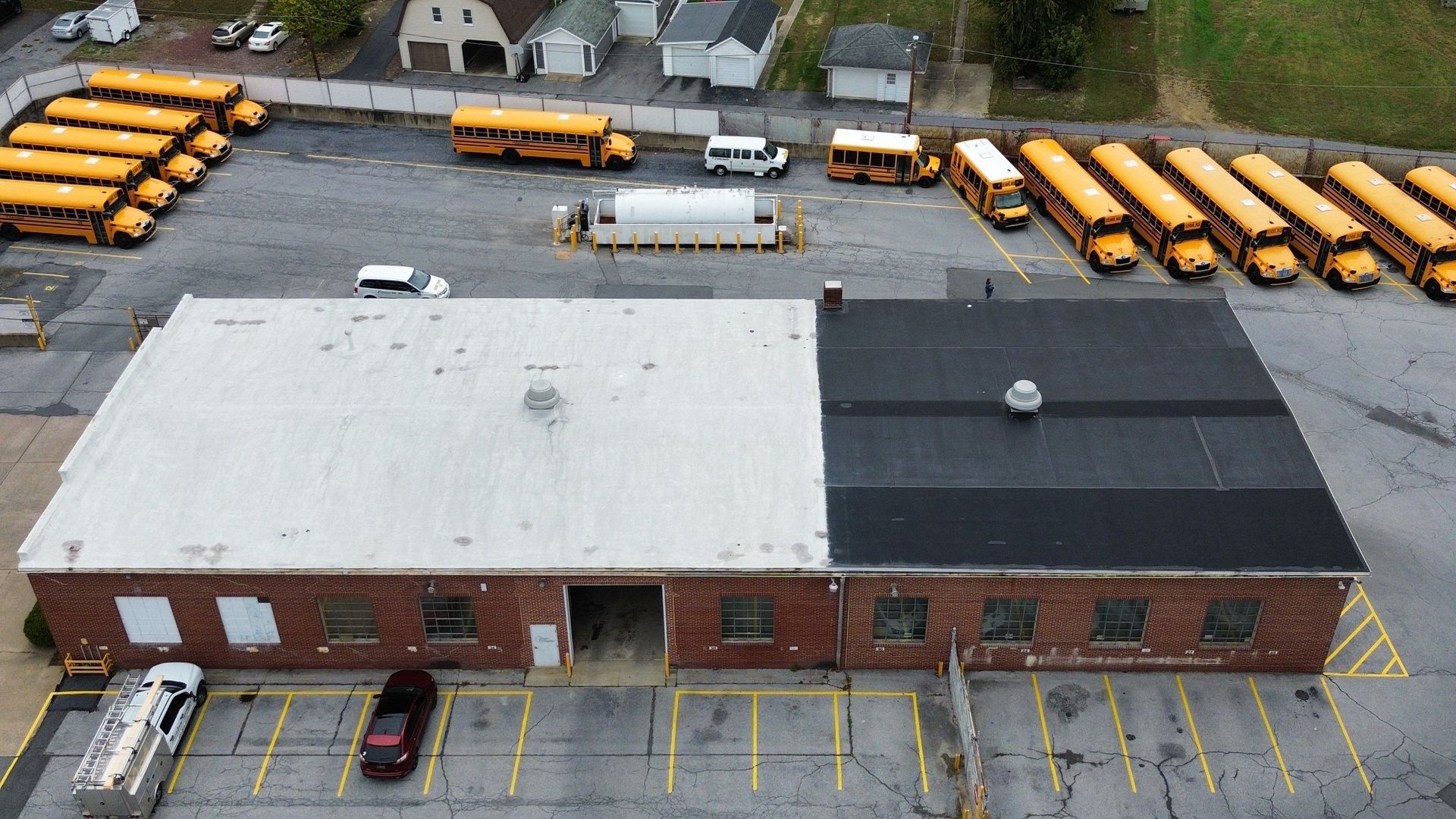 An aerial view of a large building with a roof that is covered in shingles. | Mohnton, PA | Meadow Springs