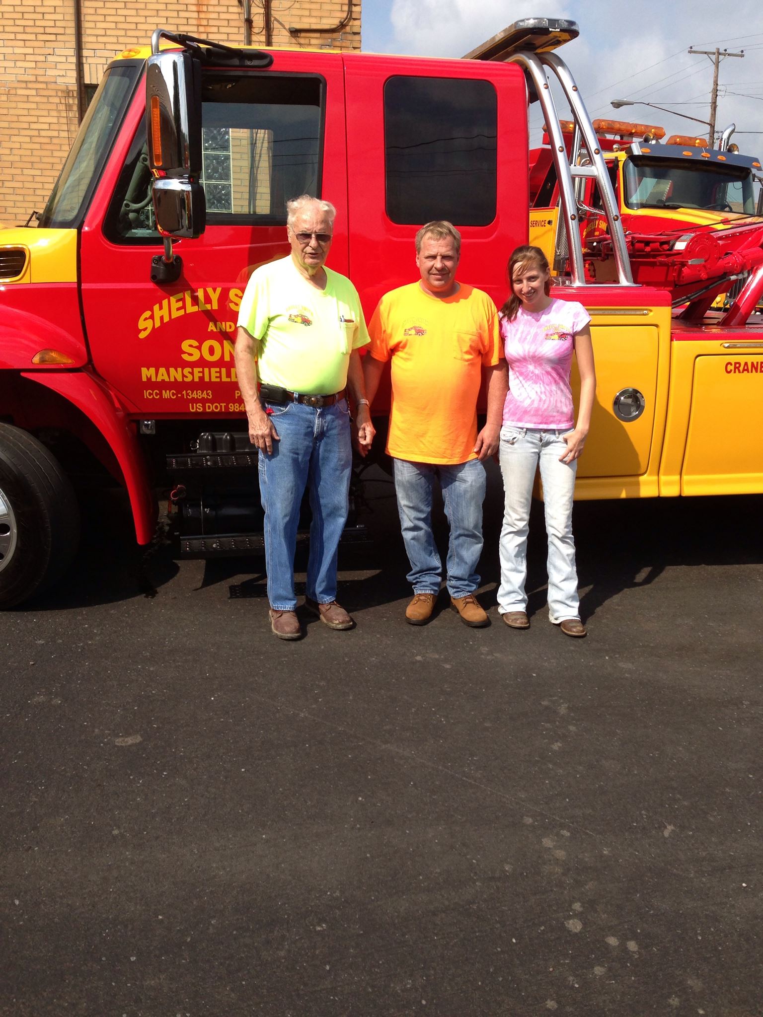 Three People Standing Near The Tow Truck - Mansfield, OH - Shelly Smith & Sons