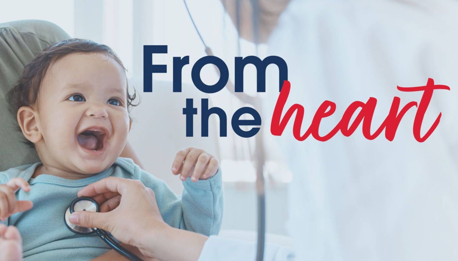 From The Heart issue two banner of a baby smiling and having their heart checked by a doctor