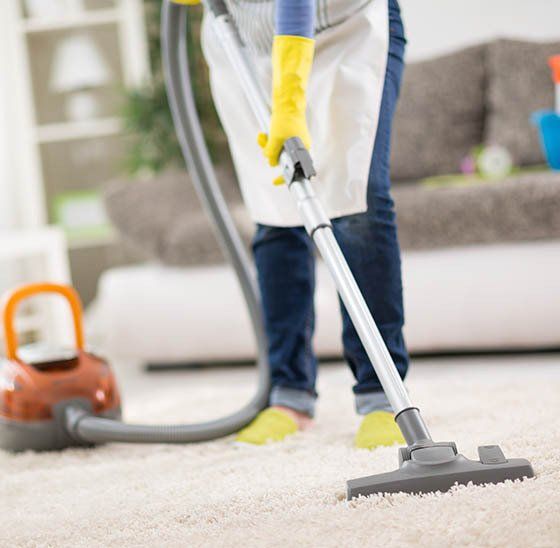 Cleans Carpet With Vacuum Cleaner — Bond Cleaners in Toowoomba, QLD