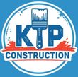 A blue and white logo for ktp construction