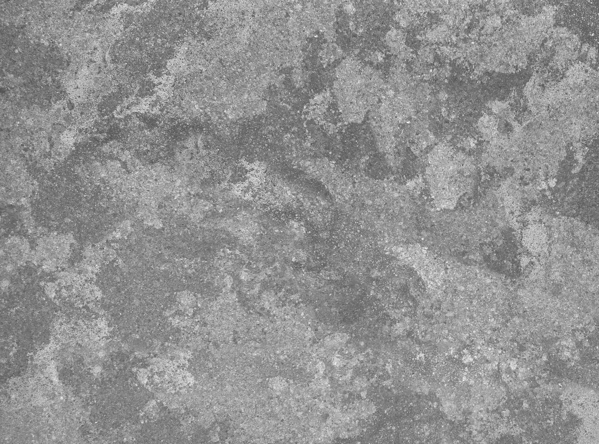A close up of a gray concrete surface.