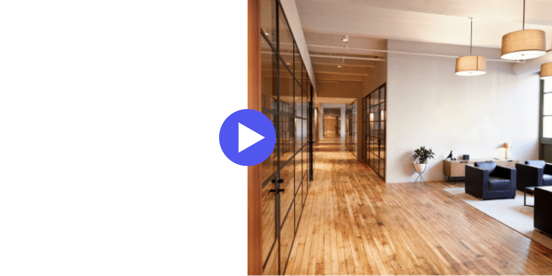 A video of a hallway with wooden floors and a play button.