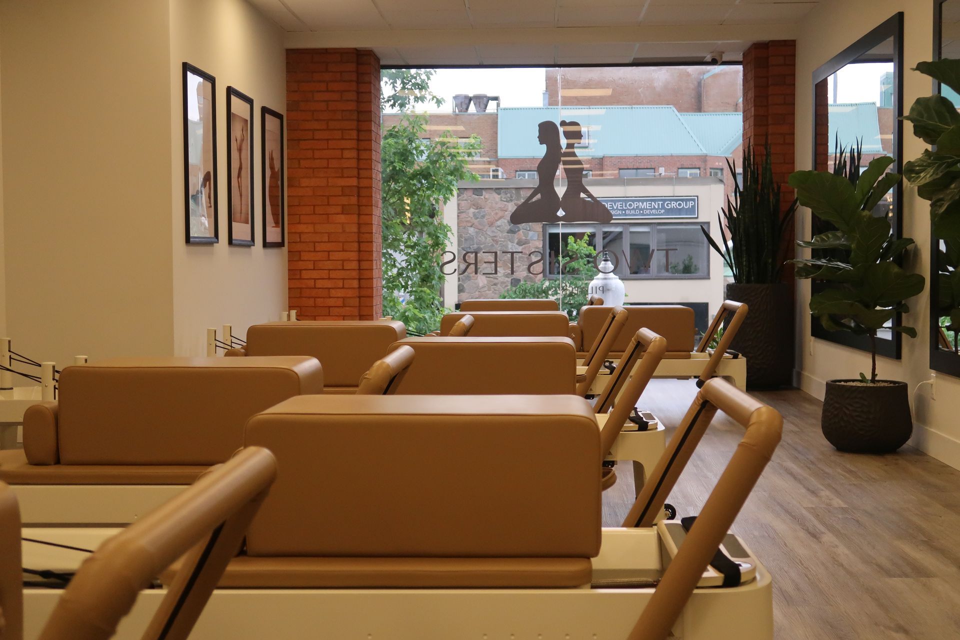 Reformer Pilates class setup at Two Sisters Pilates studio in Oakville