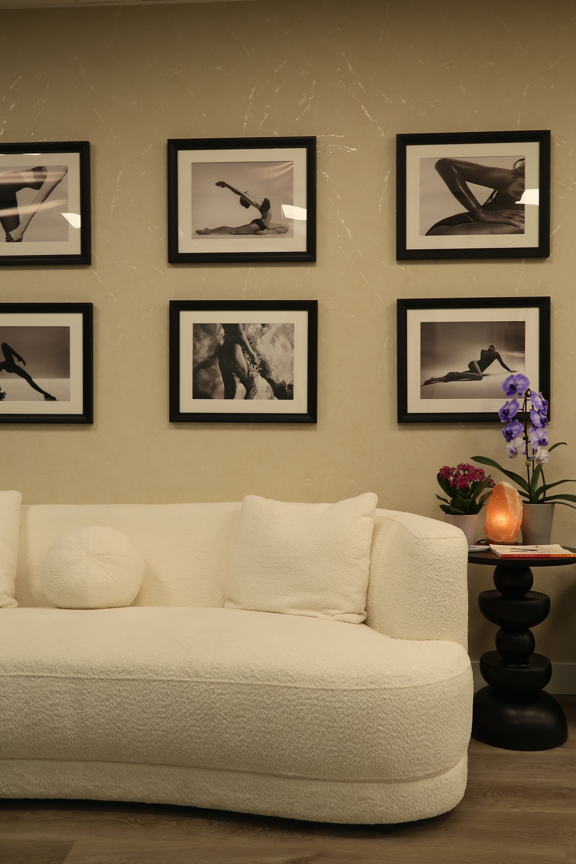 Pilates-themed wall art inside Two Sisters Pilates studio in Oakville