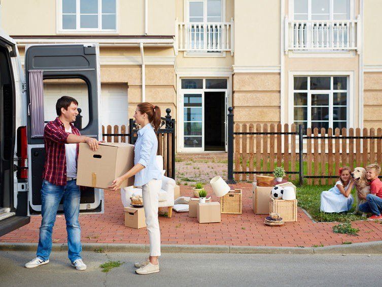 Couple Moving Boxes Into New Home — Expert Removalists In The Northern Rivers NSW
