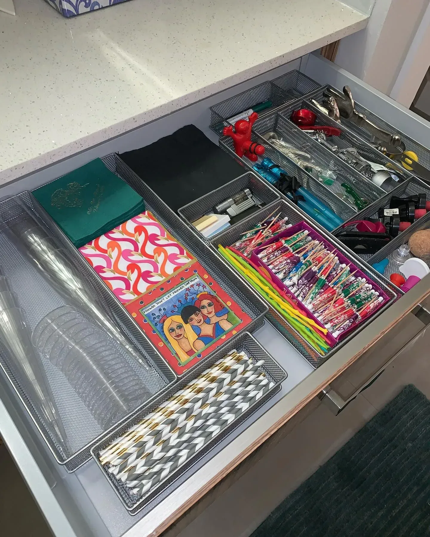 A drawer filled with lots of different types of items