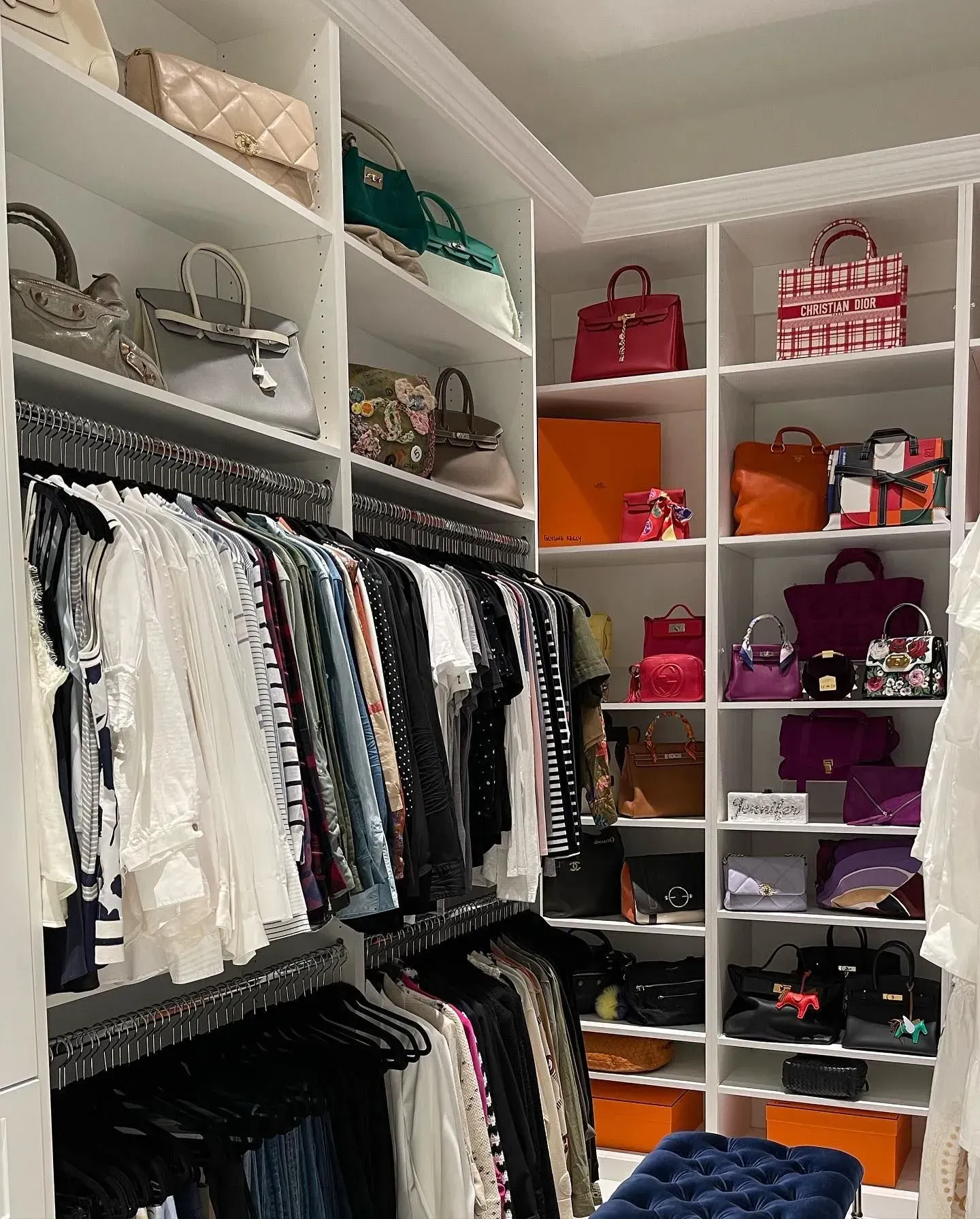 A closet filled with lots of clothes and bags