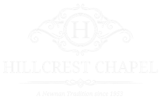 A black and white close-up shot of a stylized, artistic eye drawing with detailed lashes, a dark iris, and shading.