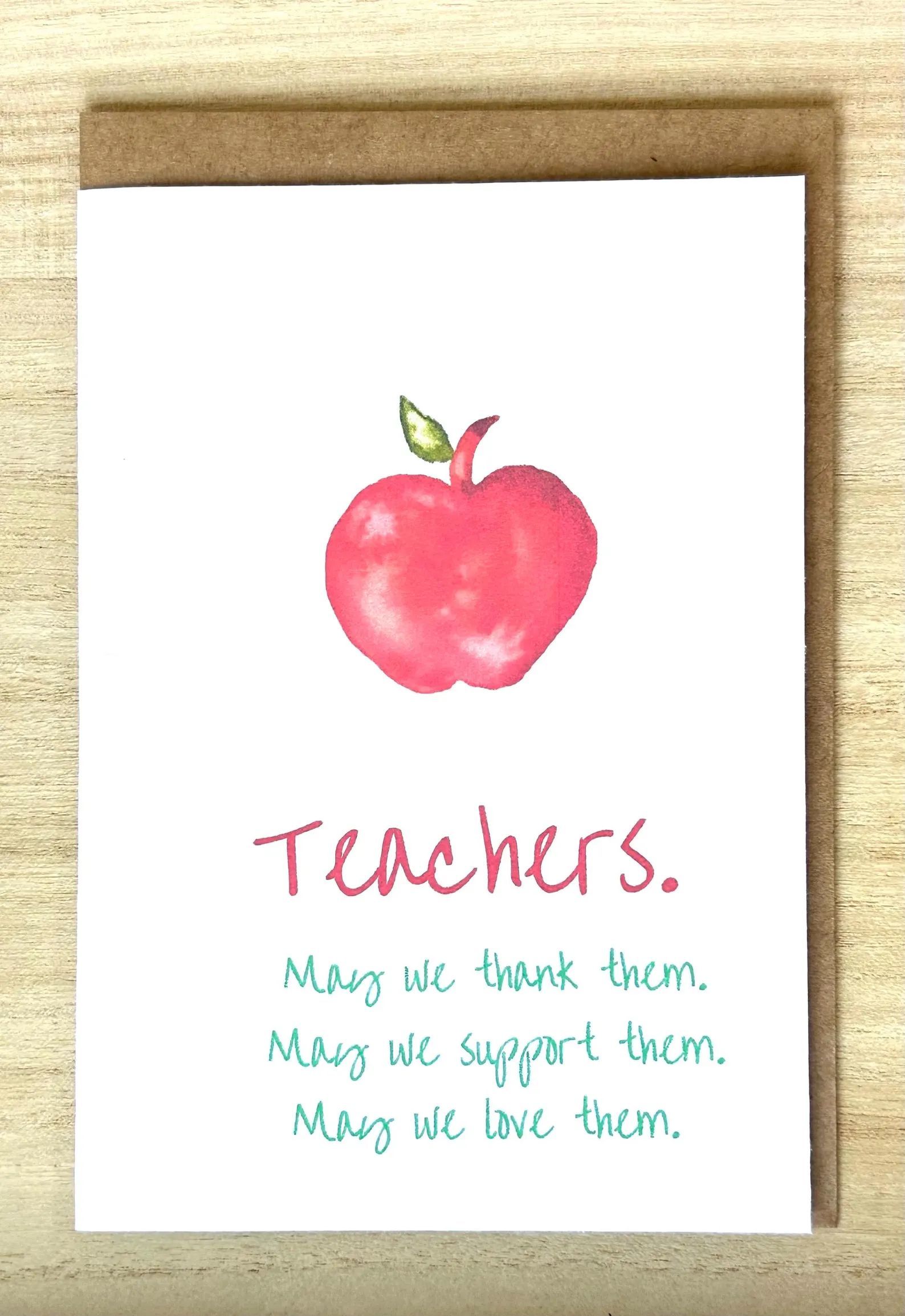 Card with red apple and text: 