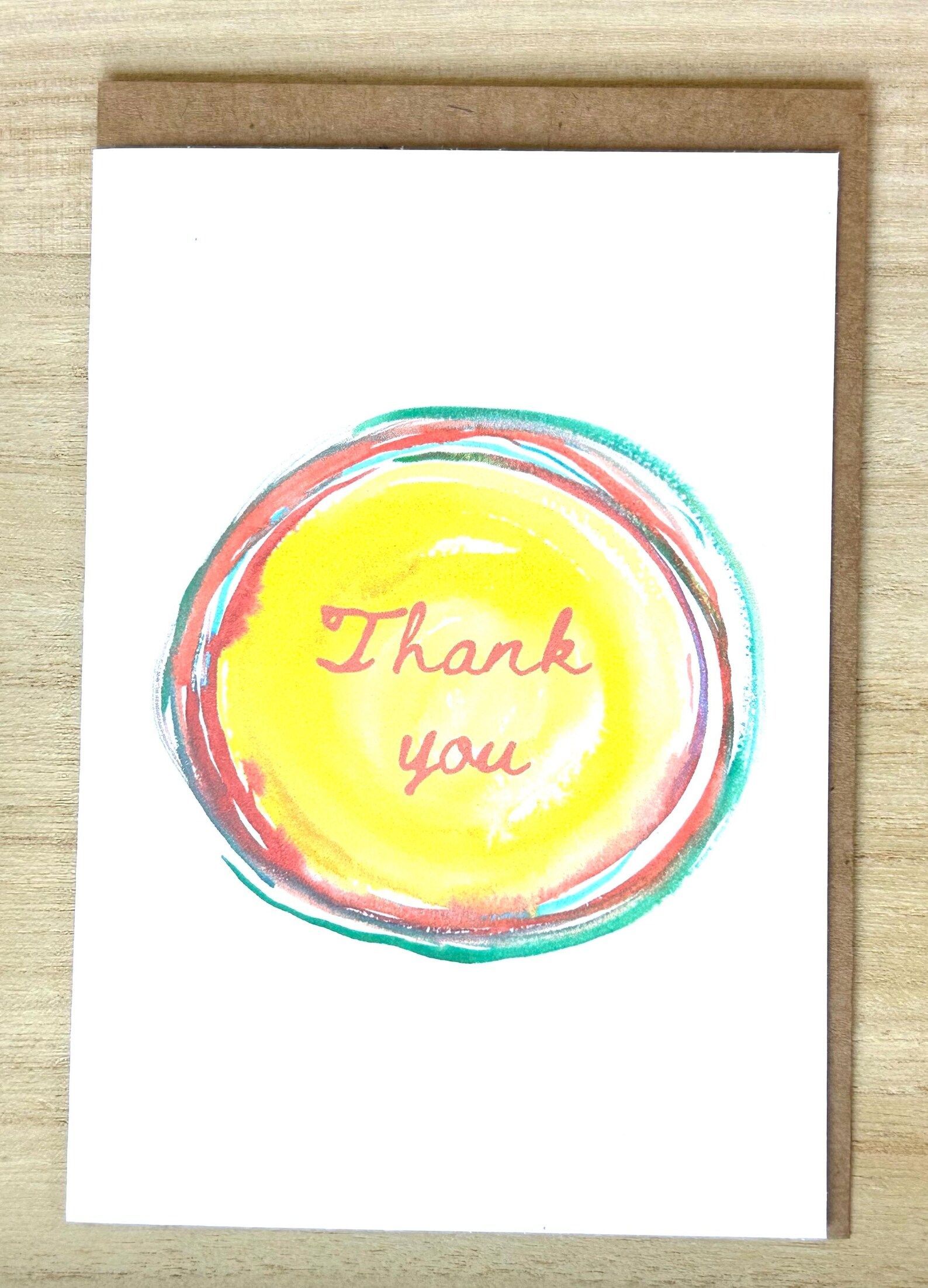 Thank you card with yellow, red, and teal watercolor circle and 