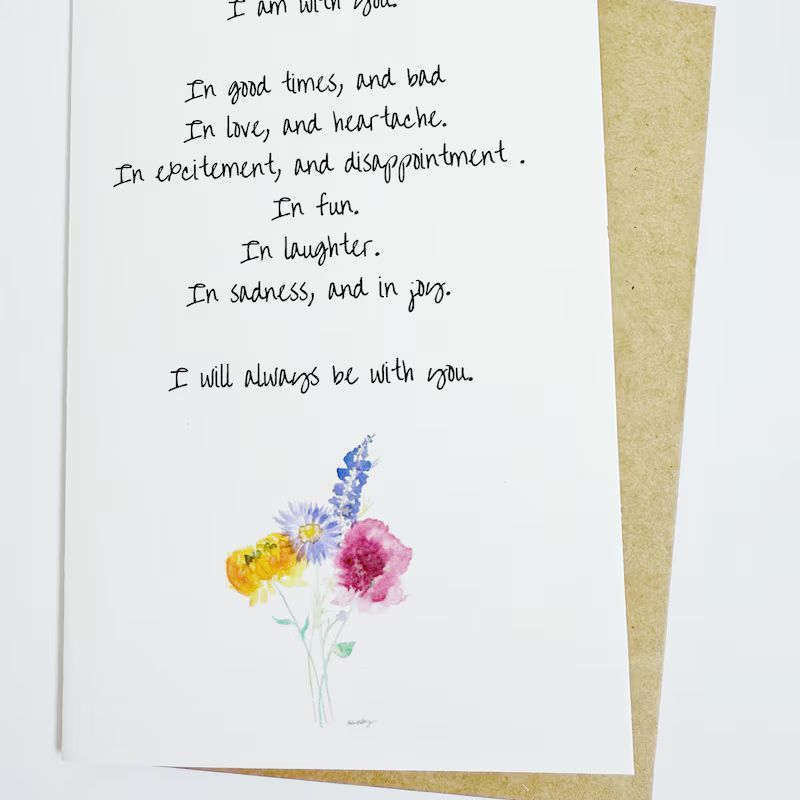 White card with handwritten message and watercolor flowers. The message is an assurance of support in all situations.