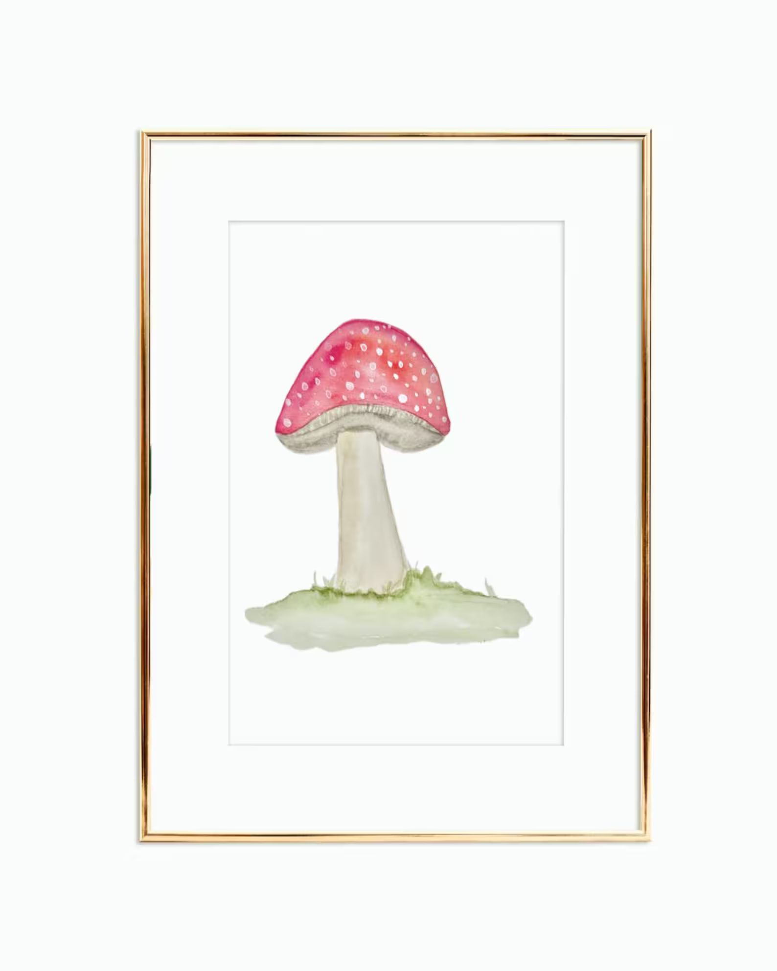 Watercolor painting of a red and white mushroom with a gold frame.