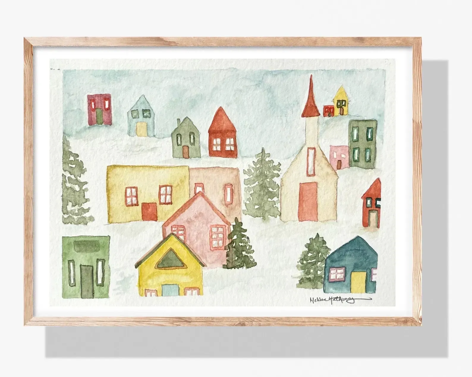 Watercolor village scene in winter, colorful houses and church in snow.