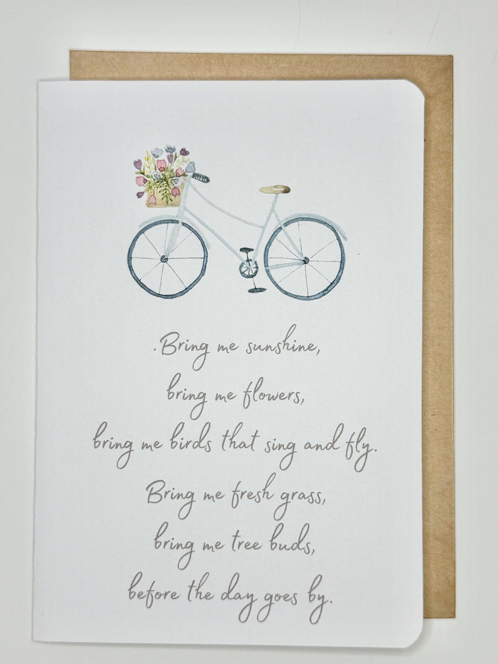 Greeting card with a bicycle illustration and handwritten poem.