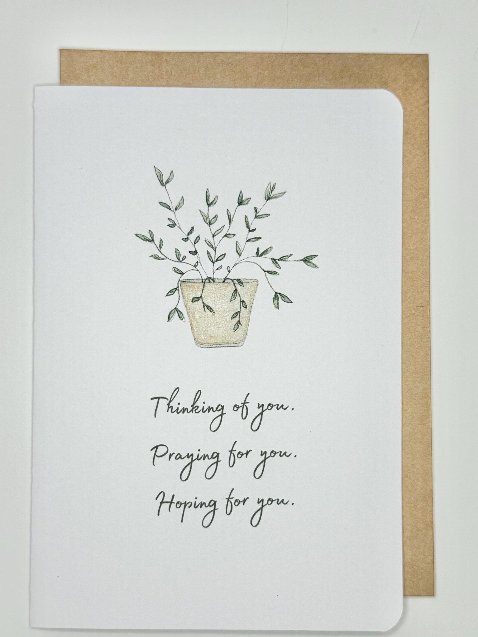 Card with watercolor plant in a pot, with the text, 