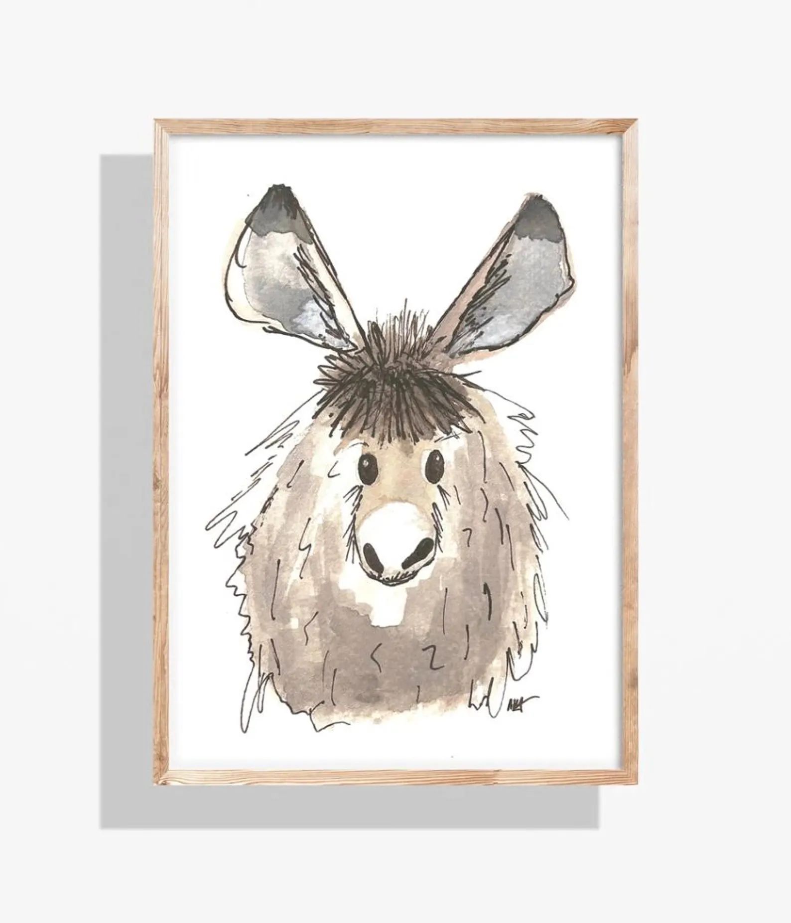 Watercolor painting of a shaggy donkey's head in a wooden frame. Brown, gray, and white.