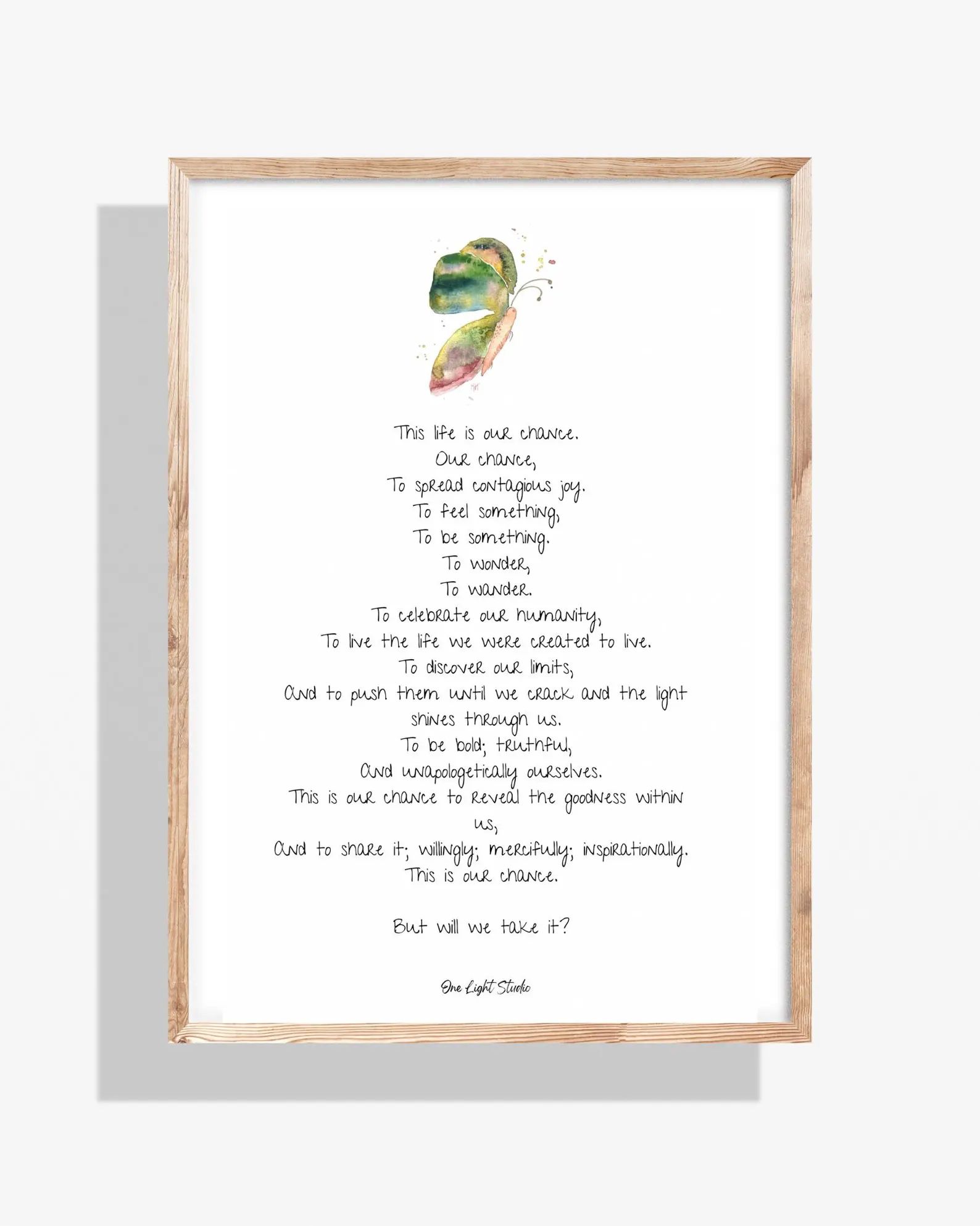 Poem in a wood frame with a watercolor feather.