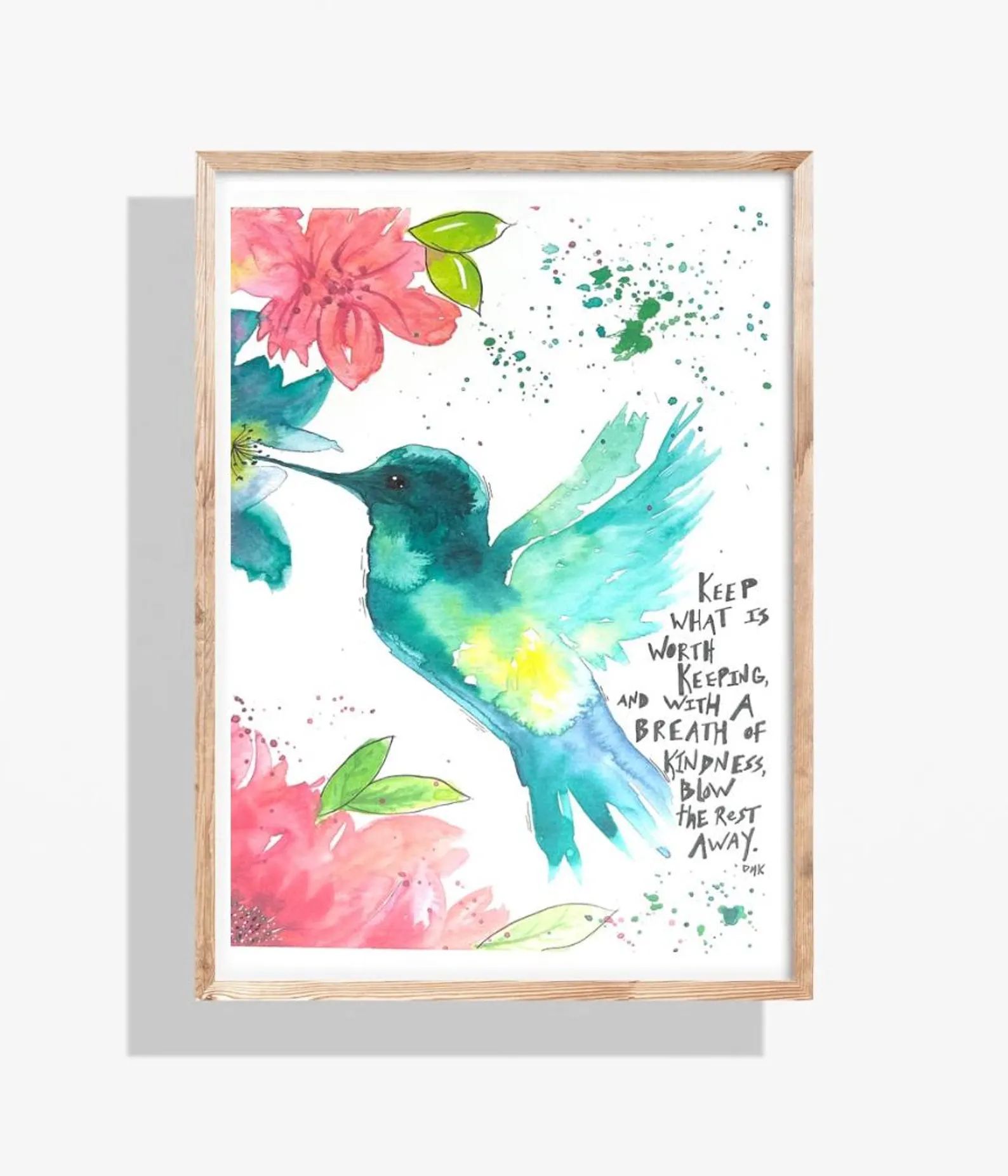 Watercolor hummingbird with flowers in a wooden frame. The bird is blue-green, and the flowers are pink. Quote: 