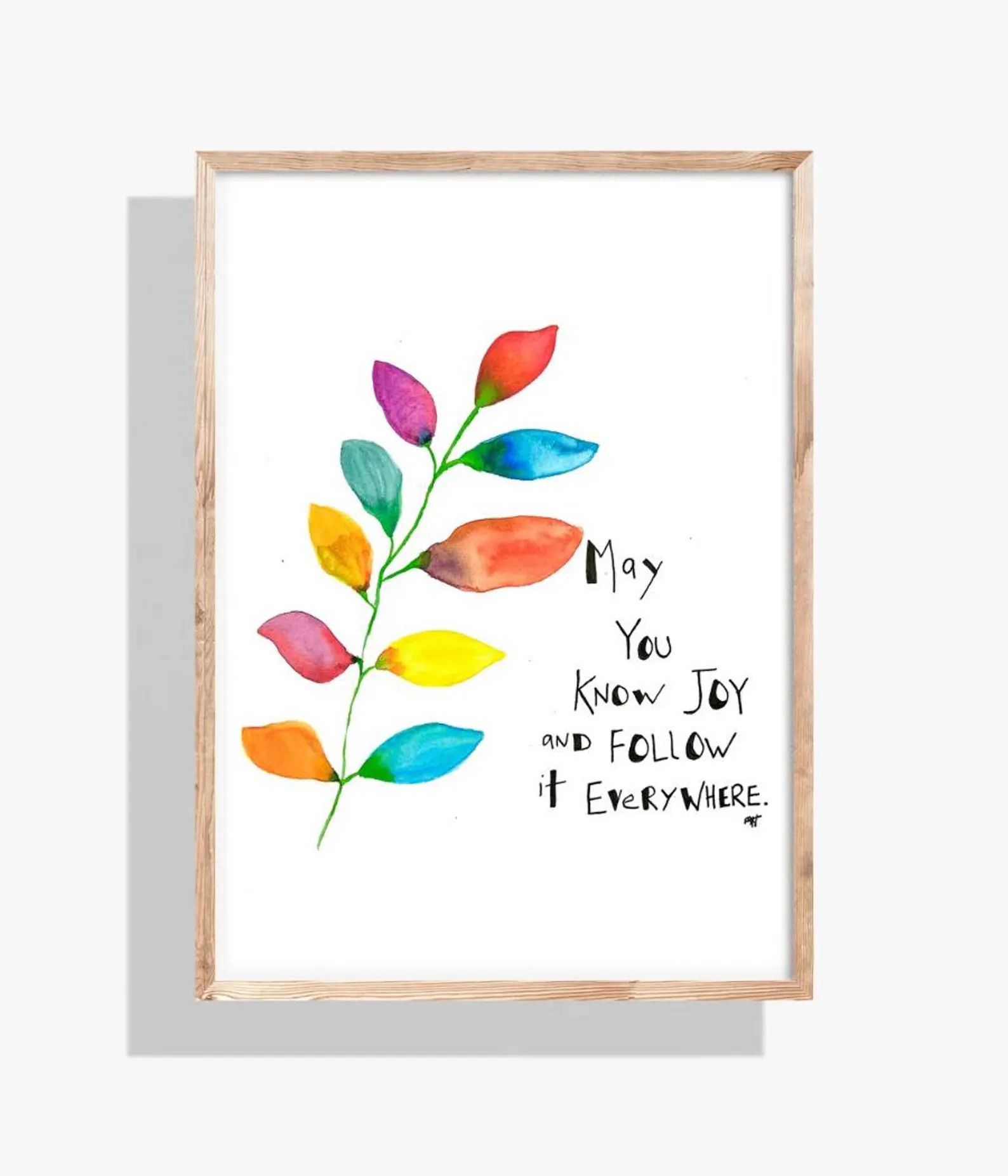 Watercolor art print: Colorful leaf with text "May you know joy and follow it everywhere." in wooden frame.