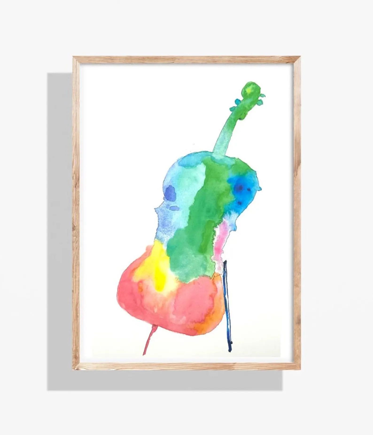 Watercolor painting of a colorful cello in a wooden frame, leaning on a black stick.
