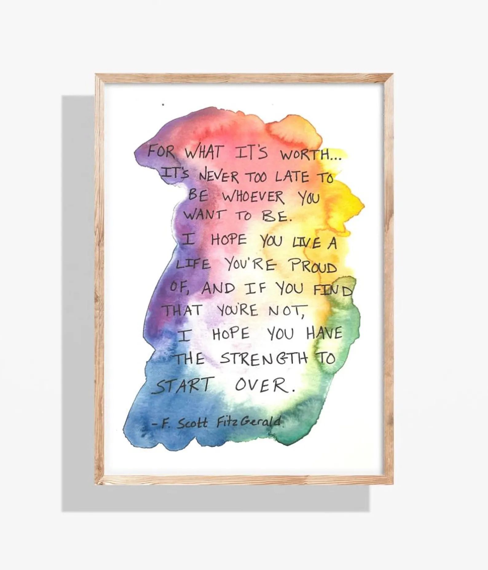Watercolor art with rainbow colors and the quote: 
