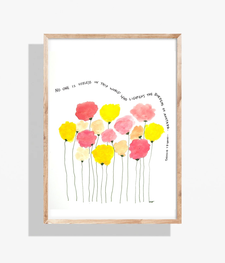 Watercolor floral art. Red and yellow flowers with thin stems. Text in a simple font. Framed.