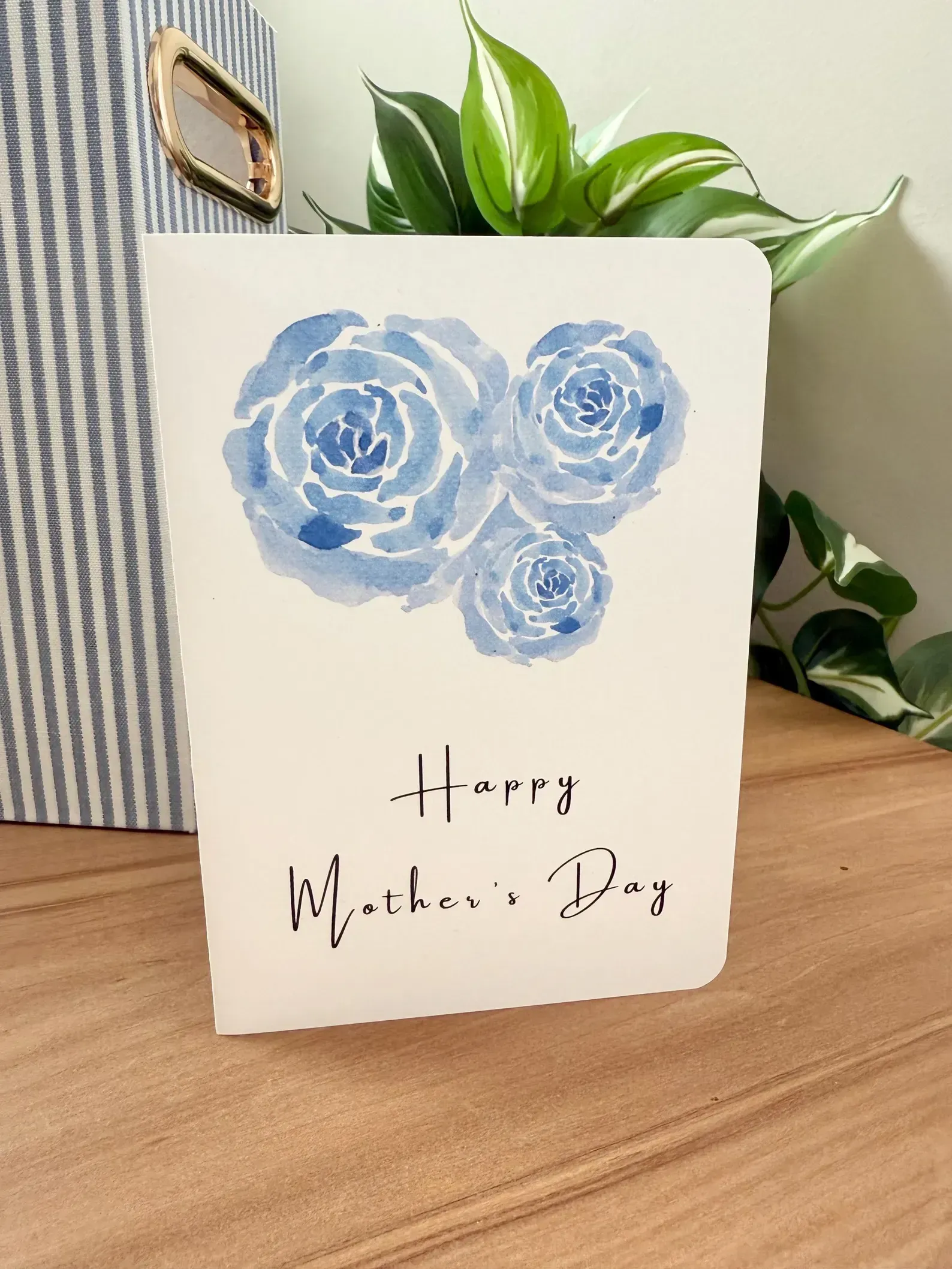 White card on wooden stand with 