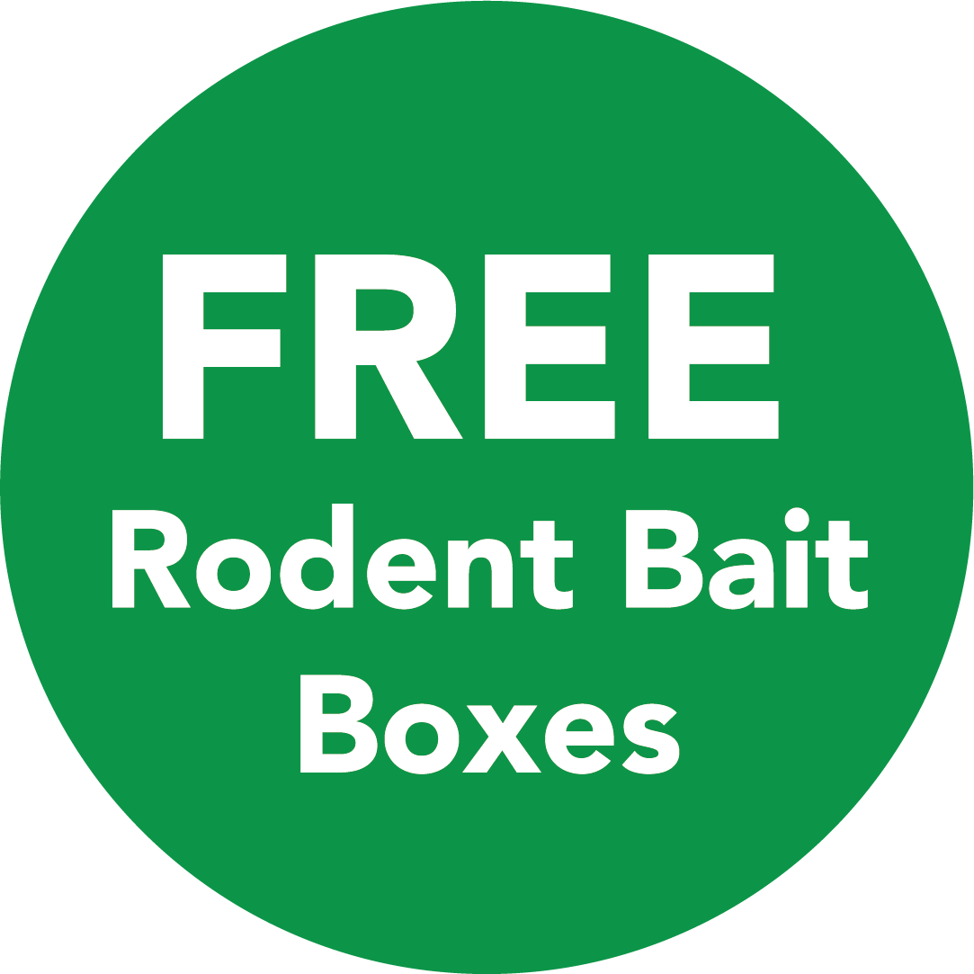 A green circle with the words `` free rodent bait boxes '' on it.