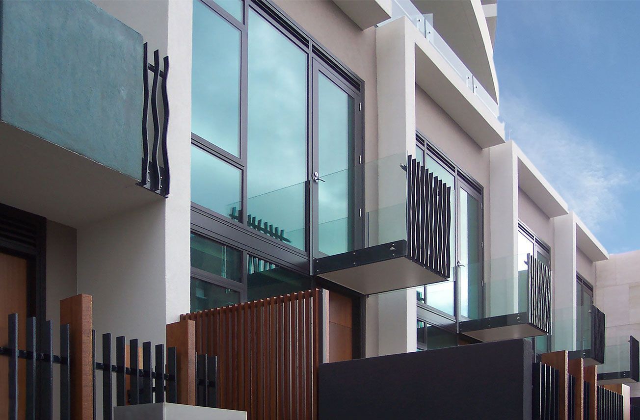 Bolt on glass balustrade on balcony