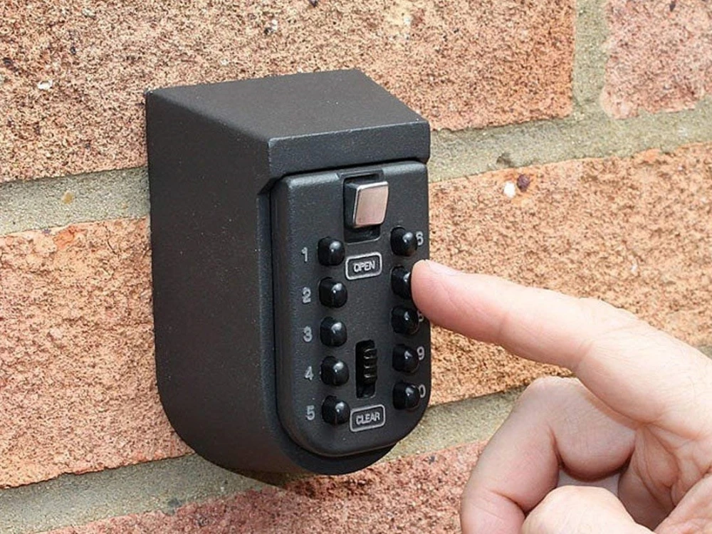 Key lock box attached to the entrance for secure key storage.